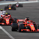 Sebastian Vettel ahead of Kimi Raikkonen at Yas Marina Circuit last year.